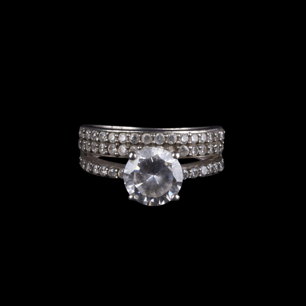 925 Sterling Silver Ring with Large Round Clear Stone and Three Rows of Small Stones