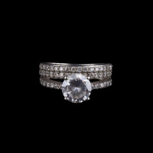 925 Sterling Silver Ring with Large Round Clear Stone and Three Rows of Small Stones
